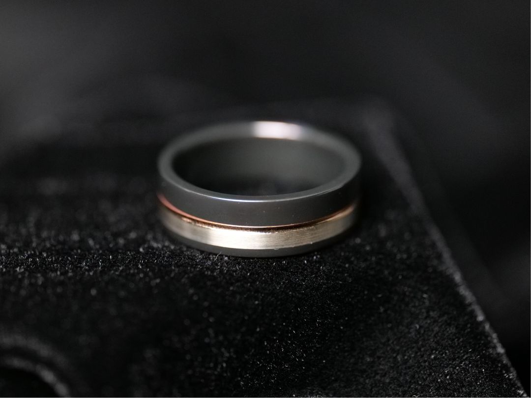 Men's black and white gold wedding ring